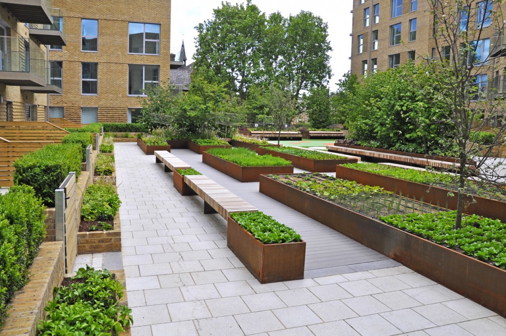 Landscape Architects, Randle Siddeley Associates & manufacturers Kinley Systems have worked with developers Lend Lease to produce bespoke benches and planters to allow residents to 'grow their own' in the Trafalgar Place garden area.