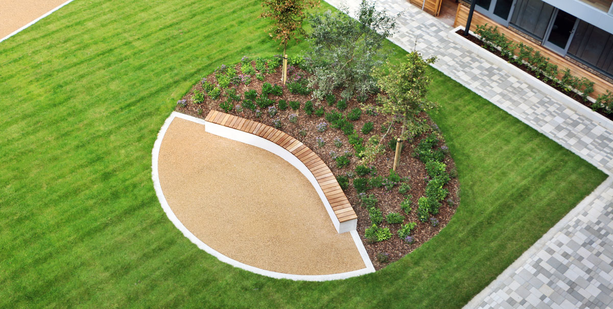 Green Roofs and Curved Benching in an Urban Village Courtyard